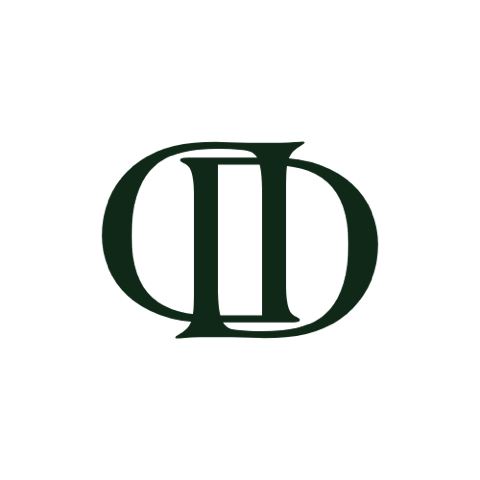 The Debrovka logo features an elegant interlocking monogram with the letters "D" and "B" in a classic serif style, set against a deep green background. This sophisticated design embodies the brand’s commitment to luxury, craftsmanship, and timeless style, perfectly representing Debrovka’s handmade leather sandals and premium leather goods.